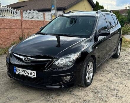 Черный Хендай i30, объемом двигателя 1.6 л и пробегом 209 тыс. км за 7300 $, фото 6 на Automoto.ua