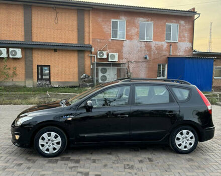 Черный Хендай i30, объемом двигателя 1.4 л и пробегом 210 тыс. км за 6750 $, фото 5 на Automoto.ua