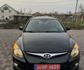 Черный Хендай i30, объемом двигателя 1.4 л и пробегом 210 тыс. км за 6750 $, фото 3 на Automoto.ua