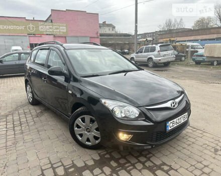 Черный Хендай i30, объемом двигателя 1.58 л и пробегом 175 тыс. км за 7500 $, фото 2 на Automoto.ua