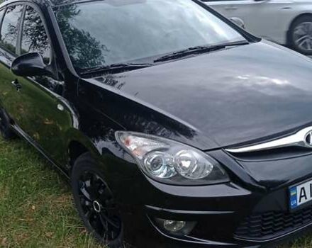 Чорний Хендай i30, об'ємом двигуна 1.59 л та пробігом 145 тис. км за 6499 $, фото 1 на Automoto.ua