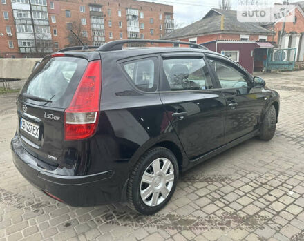 Черный Хендай i30, объемом двигателя 1.58 л и пробегом 175 тыс. км за 7500 $, фото 7 на Automoto.ua