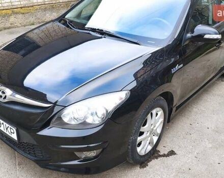 Черный Хендай i30, объемом двигателя 1.4 л и пробегом 275 тыс. км за 6000 $, фото 17 на Automoto.ua