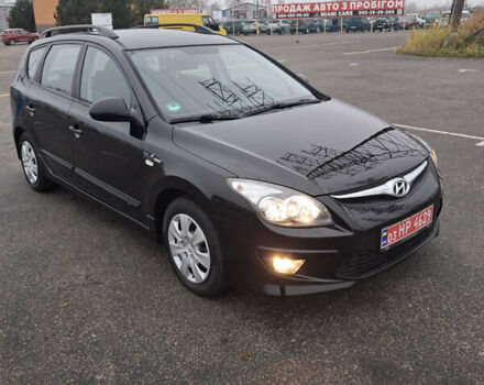 Чорний Хендай i30, об'ємом двигуна 1.4 л та пробігом 209 тис. км за 6850 $, фото 2 на Automoto.ua