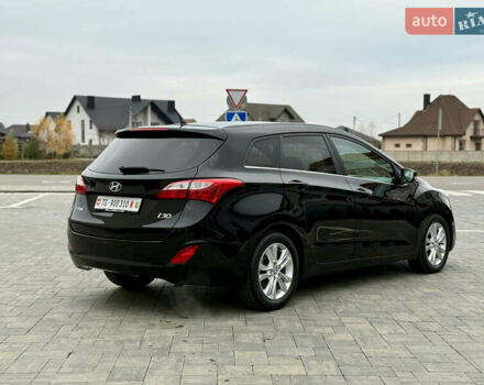 Чорний Хендай i30, об'ємом двигуна 1.6 л та пробігом 202 тис. км за 12500 $, фото 2 на Automoto.ua
