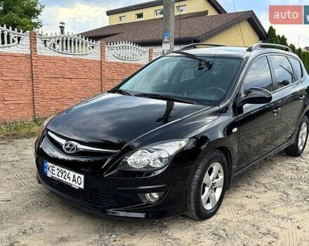 Черный Хендай i30, объемом двигателя 1.6 л и пробегом 209 тыс. км за 7300 $, фото 1 на Automoto.ua