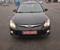 Чорний Хендай i30, об'ємом двигуна 1.4 л та пробігом 209 тис. км за 6850 $, фото 1 на Automoto.ua