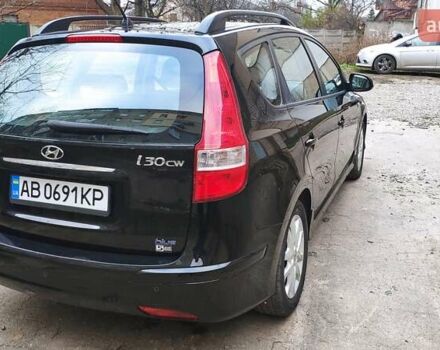 Черный Хендай i30, объемом двигателя 1.4 л и пробегом 275 тыс. км за 6000 $, фото 7 на Automoto.ua