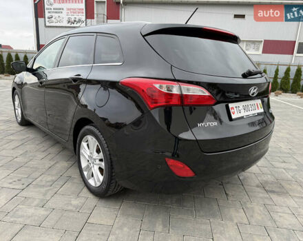 Чорний Хендай i30, об'ємом двигуна 1.6 л та пробігом 202 тис. км за 12500 $, фото 9 на Automoto.ua