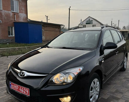 Черный Хендай i30, объемом двигателя 1.4 л и пробегом 210 тыс. км за 6750 $, фото 1 на Automoto.ua