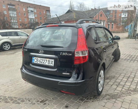 Чорний Хендай i30, об'ємом двигуна 1.58 л та пробігом 175 тис. км за 7500 $, фото 12 на Automoto.ua