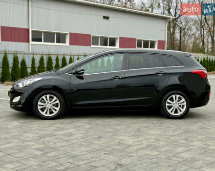 Чорний Хендай i30, об'ємом двигуна 1.6 л та пробігом 202 тис. км за 12500 $, фото 5 на Automoto.ua