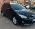 Черный Хендай i30, объемом двигателя 1.6 л и пробегом 242 тыс. км за 6900 $, фото 1 на Automoto.ua