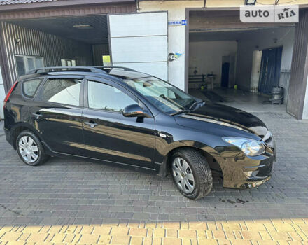 Чорний Хендай i30, об'ємом двигуна 1.58 л та пробігом 175 тис. км за 7500 $, фото 17 на Automoto.ua