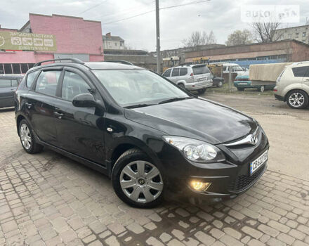 Черный Хендай i30, объемом двигателя 1.58 л и пробегом 175 тыс. км за 7500 $, фото 3 на Automoto.ua