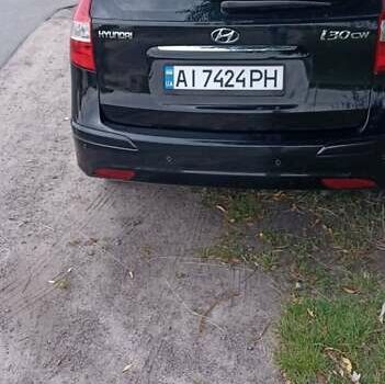 Чорний Хендай i30, об'ємом двигуна 1.59 л та пробігом 145 тис. км за 6499 $, фото 4 на Automoto.ua