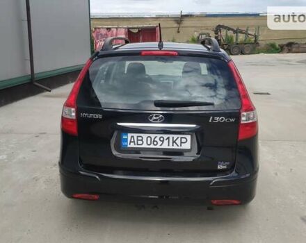 Черный Хендай i30, объемом двигателя 1.4 л и пробегом 275 тыс. км за 7100 $, фото 7 на Automoto.ua