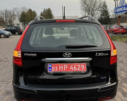 Черный Хендай i30, объемом двигателя 1.4 л и пробегом 210 тыс. км за 6750 $, фото 7 на Automoto.ua