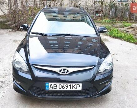 Черный Хендай i30, объемом двигателя 1.4 л и пробегом 275 тыс. км за 6000 $, фото 2 на Automoto.ua
