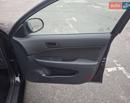 Чорний Хендай i30, об'ємом двигуна 1.4 л та пробігом 209 тис. км за 6850 $, фото 20 на Automoto.ua