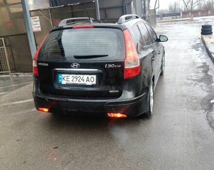 Черный Хендай i30, объемом двигателя 1.58 л и пробегом 213 тыс. км за 6899 $, фото 2 на Automoto.ua