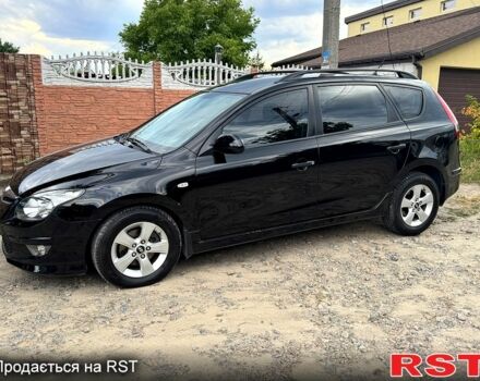 Чорний Хендай i30, об'ємом двигуна 1.6 л та пробігом 209 тис. км за 7300 $, фото 1 на Automoto.ua