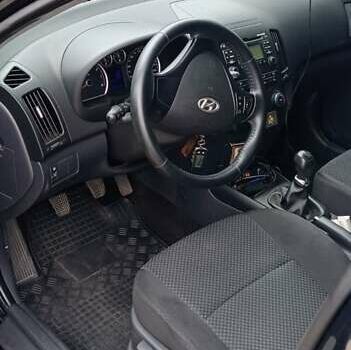 Чорний Хендай i30, об'ємом двигуна 1.59 л та пробігом 145 тис. км за 6499 $, фото 7 на Automoto.ua