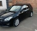 Чорний Хендай i30, об'ємом двигуна 1.6 л та пробігом 242 тис. км за 6600 $, фото 1 на Automoto.ua