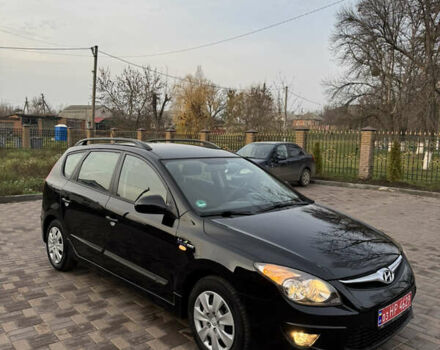 Черный Хендай i30, объемом двигателя 1.4 л и пробегом 210 тыс. км за 6750 $, фото 11 на Automoto.ua