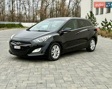 Чорний Хендай i30, об'ємом двигуна 1.6 л та пробігом 202 тис. км за 12500 $, фото 6 на Automoto.ua