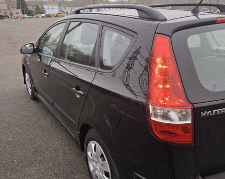 Чорний Хендай i30, об'ємом двигуна 1.4 л та пробігом 209 тис. км за 6850 $, фото 5 на Automoto.ua