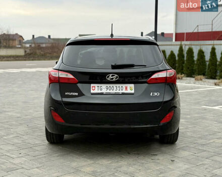 Чорний Хендай i30, об'ємом двигуна 1.6 л та пробігом 202 тис. км за 12500 $, фото 3 на Automoto.ua