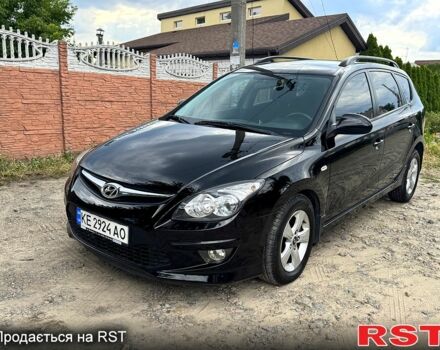 Чорний Хендай i30, об'ємом двигуна 1.6 л та пробігом 209 тис. км за 7300 $, фото 2 на Automoto.ua