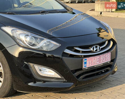 Черный Хендай i30, объемом двигателя 1.58 л и пробегом 248 тыс. км за 7800 $, фото 6 на Automoto.ua