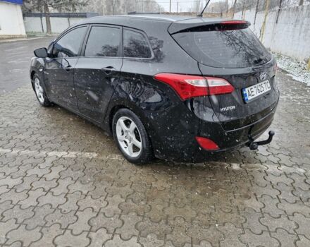 Черный Хендай i30, объемом двигателя 1.6 л и пробегом 150 тыс. км за 7700 $, фото 7 на Automoto.ua