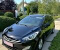 Черный Хендай i30, объемом двигателя 1.6 л и пробегом 167 тыс. км за 8400 $, фото 1 на Automoto.ua