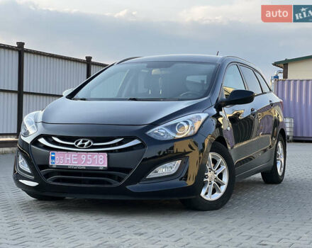Черный Хендай i30, объемом двигателя 1.58 л и пробегом 248 тыс. км за 7800 $, фото 3 на Automoto.ua