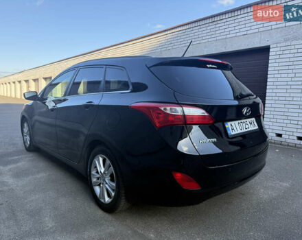 Чорний Хендай i30, об'ємом двигуна 1.59 л та пробігом 260 тис. км за 9000 $, фото 3 на Automoto.ua