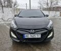 Черный Хендай i30, объемом двигателя 1.6 л и пробегом 150 тыс. км за 7700 $, фото 1 на Automoto.ua
