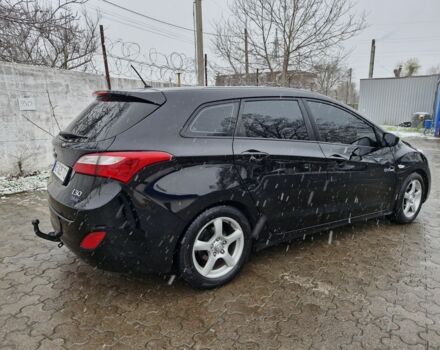Черный Хендай i30, объемом двигателя 1.6 л и пробегом 150 тыс. км за 7700 $, фото 4 на Automoto.ua