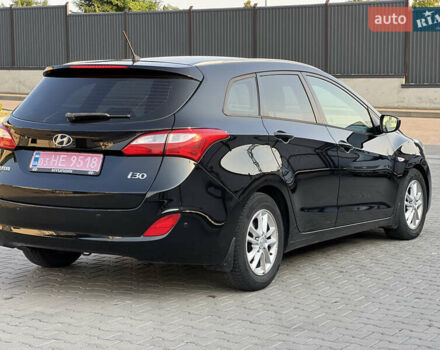 Черный Хендай i30, объемом двигателя 1.58 л и пробегом 248 тыс. км за 7800 $, фото 16 на Automoto.ua