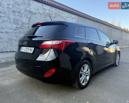 Чорний Хендай i30, об'ємом двигуна 1.59 л та пробігом 260 тис. км за 9000 $, фото 1 на Automoto.ua