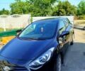 Чорний Хендай i30, об'ємом двигуна 1.4 л та пробігом 230 тис. км за 7700 $, фото 1 на Automoto.ua