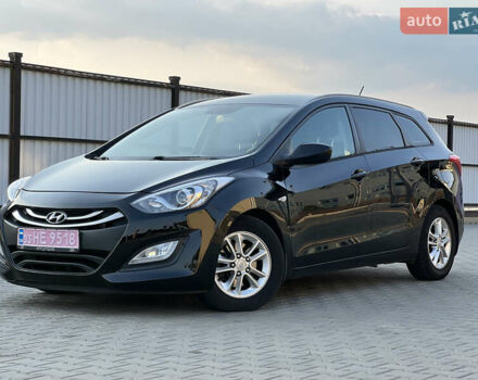 Черный Хендай i30, объемом двигателя 1.58 л и пробегом 248 тыс. км за 7800 $, фото 1 на Automoto.ua
