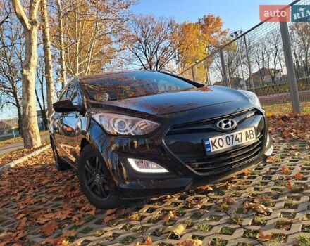 Черный Хендай i30, объемом двигателя 1.58 л и пробегом 132 тыс. км за 9500 $, фото 5 на Automoto.ua