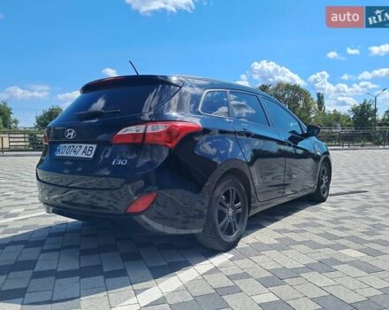Черный Хендай i30, объемом двигателя 1.6 л и пробегом 129 тыс. км за 9990 $, фото 12 на Automoto.ua