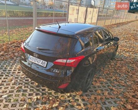 Черный Хендай i30, объемом двигателя 1.58 л и пробегом 132 тыс. км за 9500 $, фото 18 на Automoto.ua