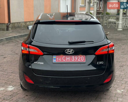Чорний Хендай i30, об'ємом двигуна 1.6 л та пробігом 221 тис. км за 8650 $, фото 3 на Automoto.ua