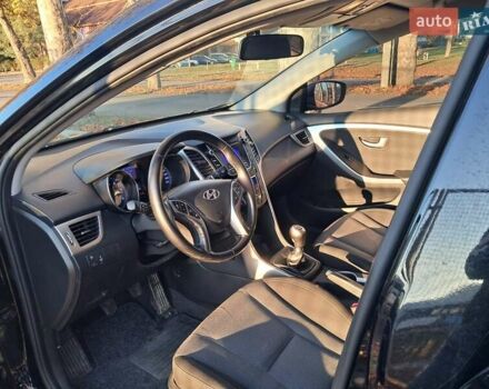 Черный Хендай i30, объемом двигателя 1.58 л и пробегом 132 тыс. км за 9500 $, фото 24 на Automoto.ua