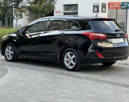 Черный Хендай i30, объемом двигателя 1.58 л и пробегом 153 тыс. км за 9500 $, фото 21 на Automoto.ua